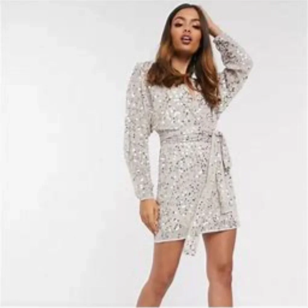 ASOS Design Petite mini dress with batwing sleeve and wrap waist in scatter sequin-Gold ASOS Design Petite mini dress with batwing sleeve and wrap waist in scatter sequin-Gold
